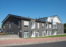 Wohn- Geschäftsgebäude Kirchhoven